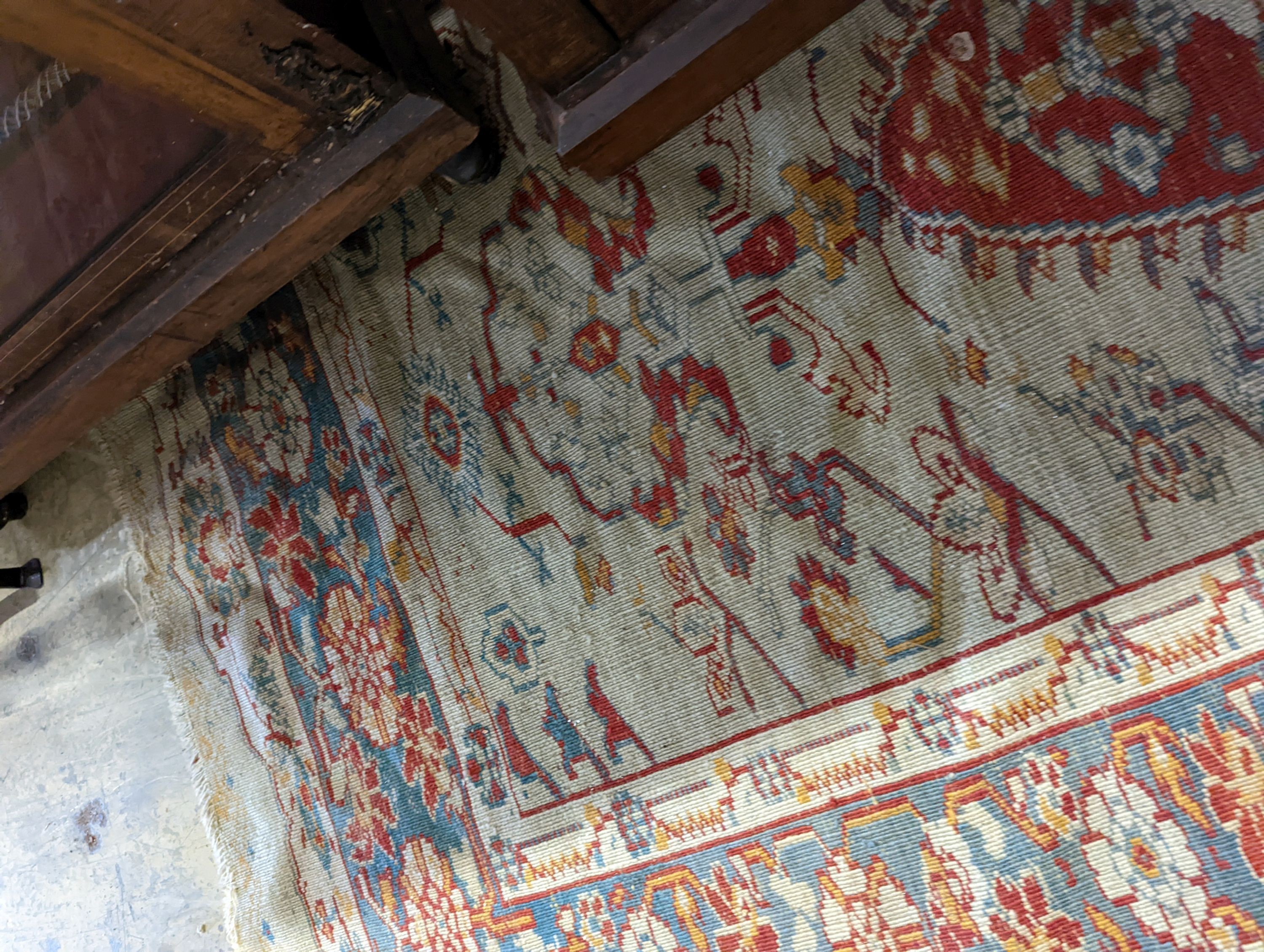 An antique Turkish? ivory ground rug, 218 cm long, 145 cm wide